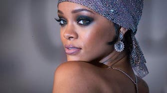 Rihanna honored at fashion awards, wears see-through dress