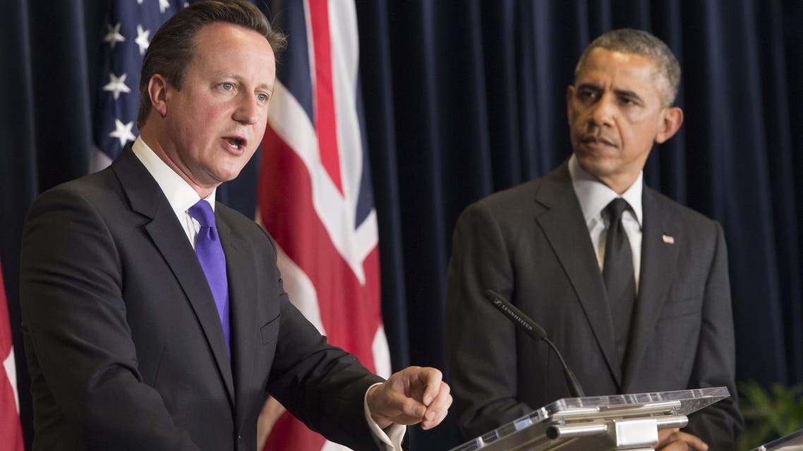 US President Barack Obama (R) and British Prime Minister David Cameron hold a joint press conference during the G7 Summit at the European Council in Brussels, on June 5, 2014. (Reuters)