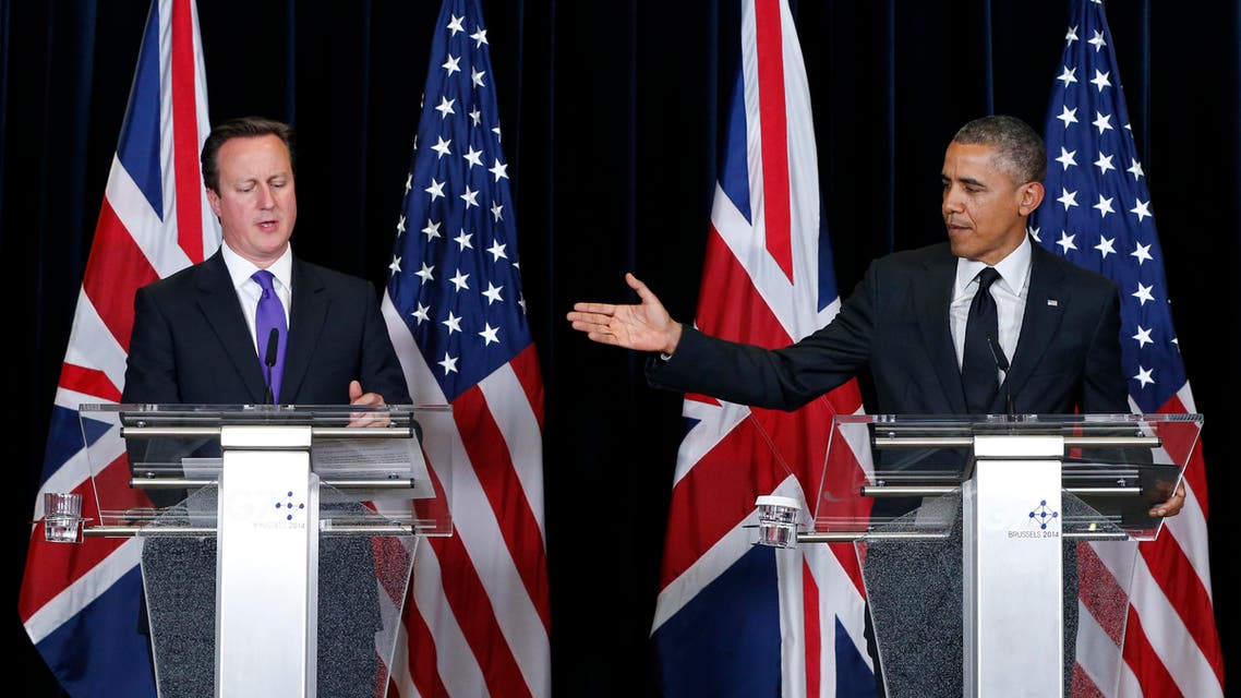 Britain's Prime Minister David Cameron (L) and U.S. President Barack Obama (R) hold a joint news conference at the end of a G7 leaders meeting at European Council headquarters in Brussels June 5, 2014. (Reuters)