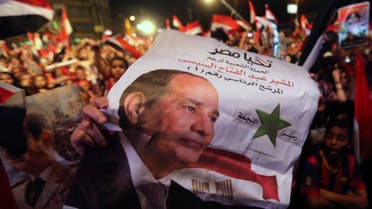 Egyptians gather outside the presidential palace to celebrate former Egyptian army chief Abdel Fattah al-Sisi's victory in the presidential vote in Cairo June 5, 2014.  (Reuters)
