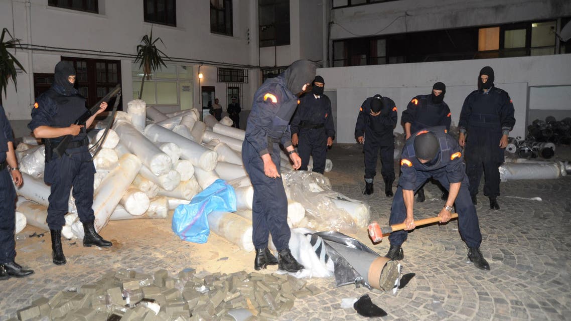 Moroccan police seize 16.7 tonnes of hashish, known locally as "chira", hidden inside plastic rollers and tubing during a raid on the Moroccan city of Casablanca on June 9, 2014. (AFP)