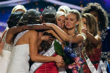 Fellow contestants celebrate with Miss Nevada Nia Sanchez after she won the 2014 Miss USA beauty pageant in Baton Rouge, Louisiana June 8, 2014. (Reuters)