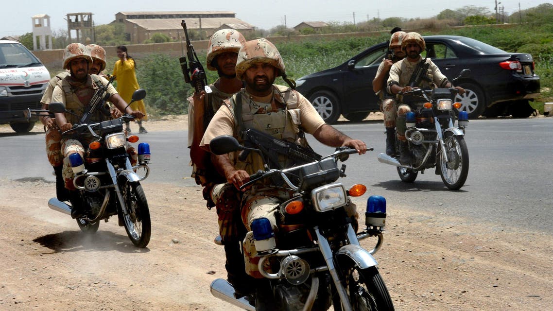 Pakistani security personnel rush towards the firing incident near Karachi airport in Karachi on June 10, 2014. (AFP)