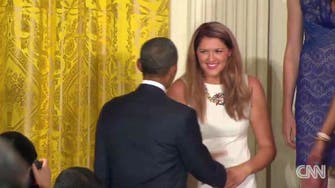 Whoops! Embarrassing moment woman falls during Obama speech