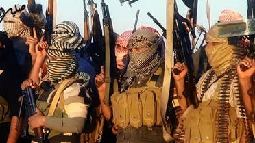 the jihadist group the Islamic State of Iraq and the Levant (ISIL) allegedly shows ISIL militants near the central Iraqi city of Tikrit. Militants battled Iraqi security forces in Tikrit on June 11, 2014. (AFP)