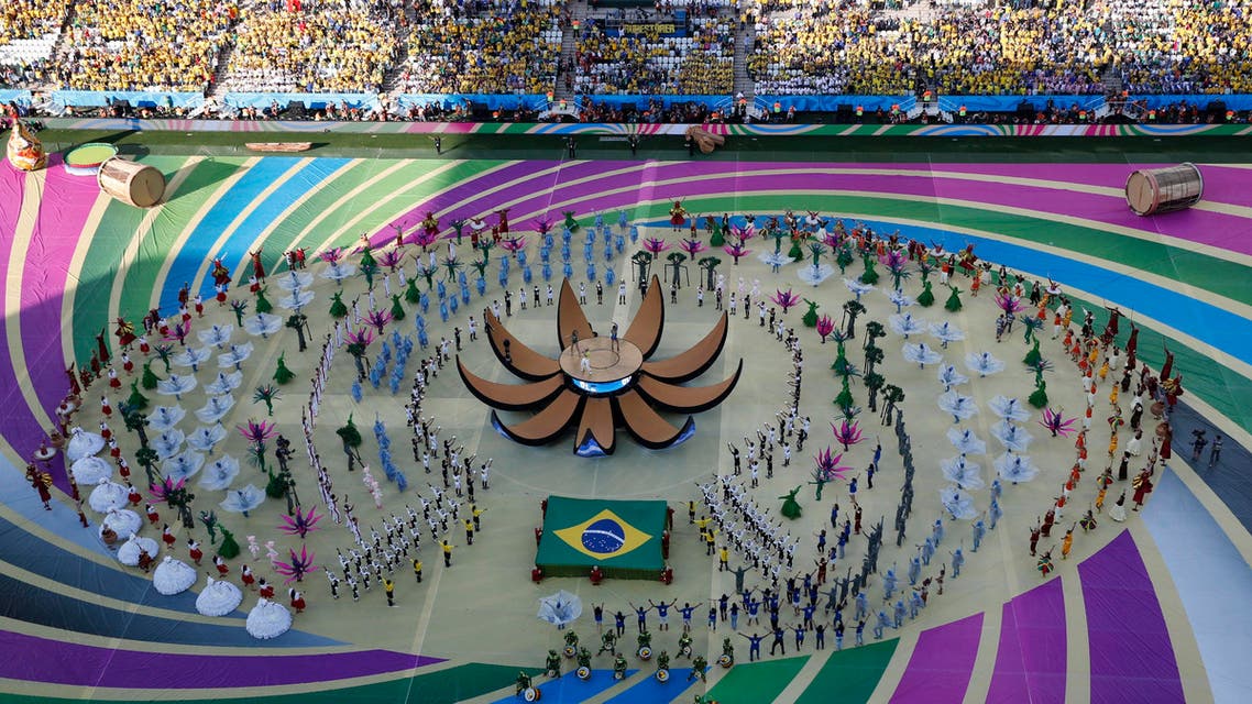 Singers Claudia Leitte, Jennifer Lopez and Pitbull perform during the 2014 World Cup opening ceremony at the Corinthians arena in Sao Paulo June 12, 2014. (Reuters)