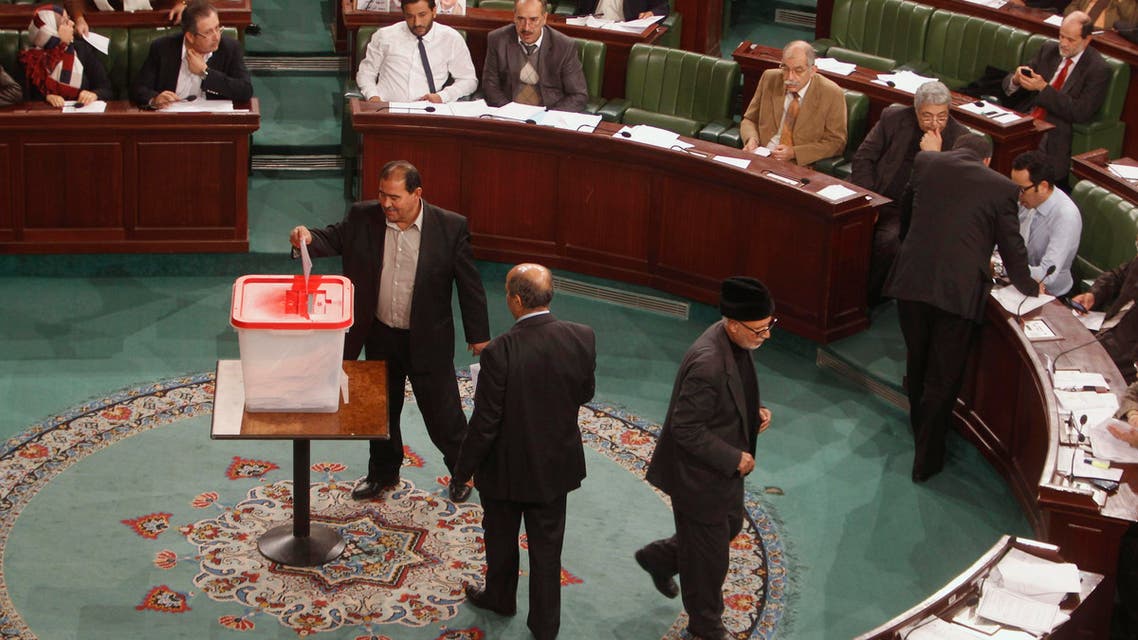 Members of the Tunisian parliament cast their vote over the composition of an election commission. (File photo Reuters)