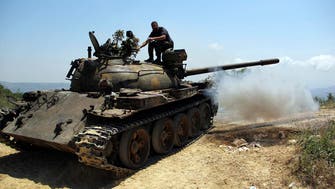 NGO: Syria rebels, jihadists withdraw from town near Turkey
