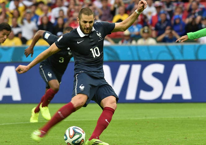 France's forward Karim Benzema takes a penalty during their World Cup match against Honduras at the Beira-Rio Stadium in Porto Alegre. (AFP Photo)