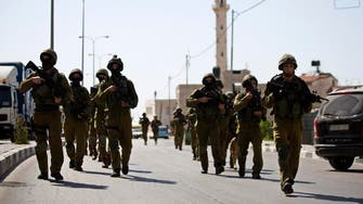Israel arrests 65 Palestinians as it presses hunt for teens              