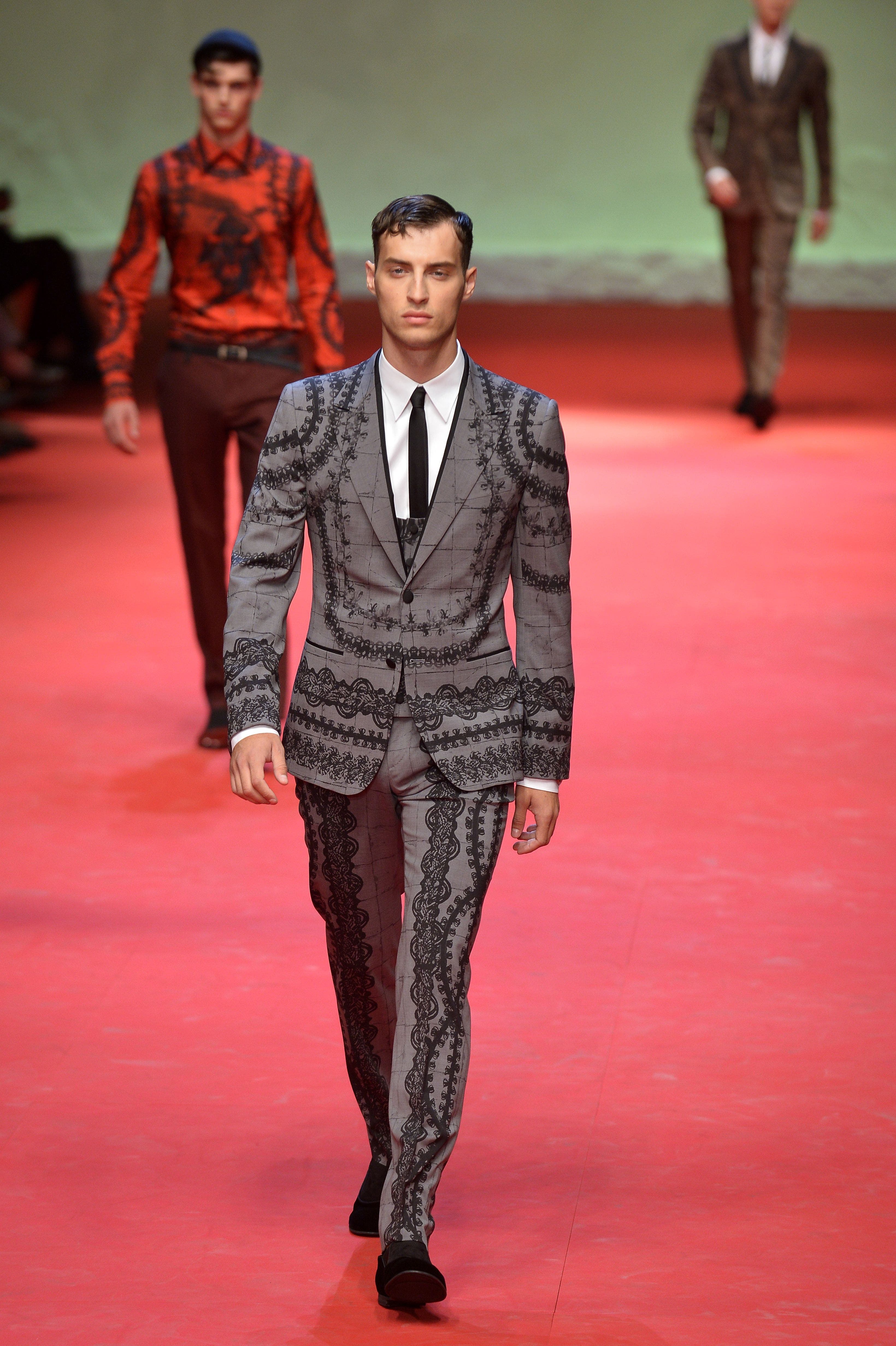 Dolce&Gabbana presents a flourish of crimson suits | Al Arabiya English