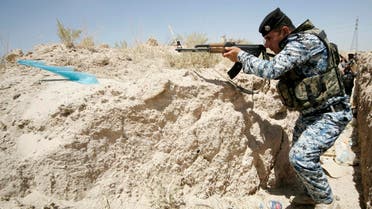 A member of the Iraqi security forces takes position during a patrol looking for militants of the Islamic State of Iraq and the Levant (ISIL) at the border between Iraq and Saudi Arabia, June 23, 2014. reuters