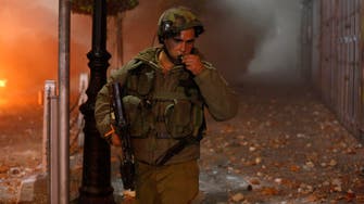 Israel arrests 37 in West Bank as manhunt drags on