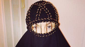 Madonna covers up in black burqa selfie 