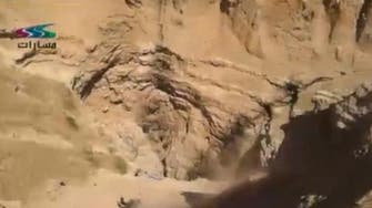 Shocking video: ISIS dumps bodies of executed rivals in deep gorge