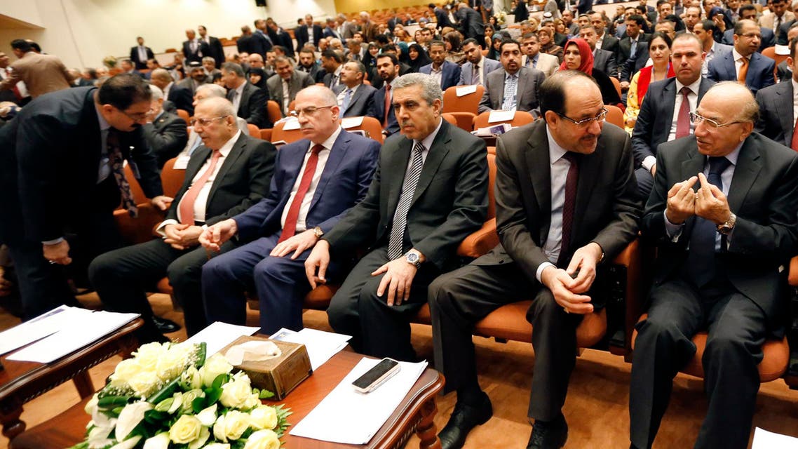 Iraqi Prime Minister Nuri al-Maliki (2rd R) attends a session at the parliament headquarters in Baghdad July 1, 2014. (Reuters)
