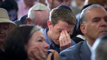 People attend a memorial service for three missing Israeli teenagers whose bodies were found in the occupied West Bank, in New York July 1, 2014.  Reuters