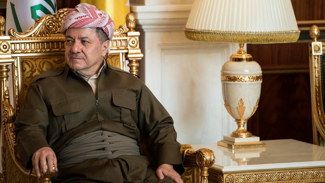 Kurdistan Regional Government President Massoud Barzani listens to U.S. Secretary of State John Kerry as he gives a statement to the media before a meeting at the presidential palace in Arbil, the capital of northern Iraq's Kurdistan autonomous region, June 24, 2014.