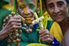 Brazilian fans attend the FIFA Fan Fest during the Brazil vs Colombia quarter-final football match. (AFP)