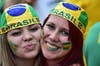 Brazilian fans attend the FIFA Fan Fest during the Brazil vs Colombia quarter-final football match. (AFP)