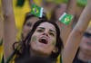 A Brazilian fan cheers before a quarter-final football match between Brazil and Colombia. (AFP)