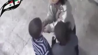 Video shows Syrian children take turns to share a small bite