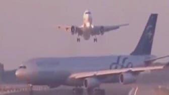 Watch Boeing 747 aborting landing to avoid runway crash   