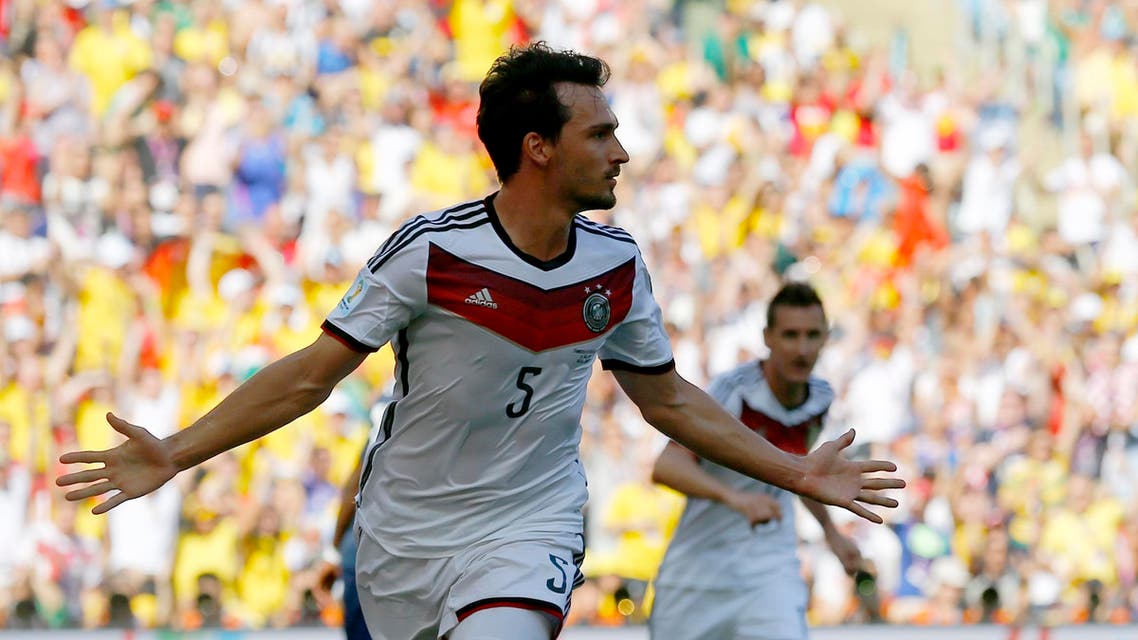 Germany's Mats Hummels celebrates after scoring a goal against France during the 2014 World Cup quarter-finals soccer match at the Maracana stadium in Rio de Janeiro July 4, 2014. (Reuters)