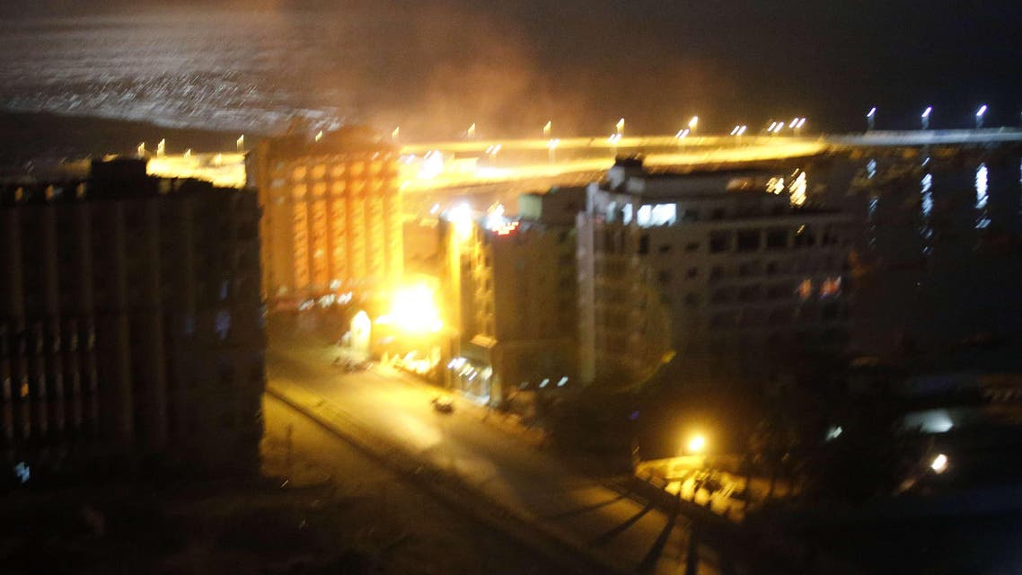 Israeli artillery strikes a Palestinian Hamas police building during an airstrike in Gaza City on July 8, 2014. afp