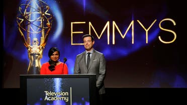 Actress Mindy Kaling (L) and television host Carson Daly stand side by side during the nominations announcement for the 66th Primetime Emmy Awards in North Hollywood, California July 10, 2014. (Reuters)