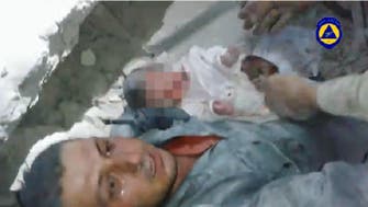 Rescue workers pull baby from rubble in Aleppo 
