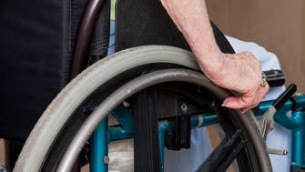 Saudi women push wheelchairs in Makkah’s Grand Mosque to make a living