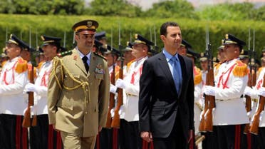 yrian President Bashar al-Assad (C) reviewing the honor guard, ahead of being sworn in for a new seven-year term. (Reuters)