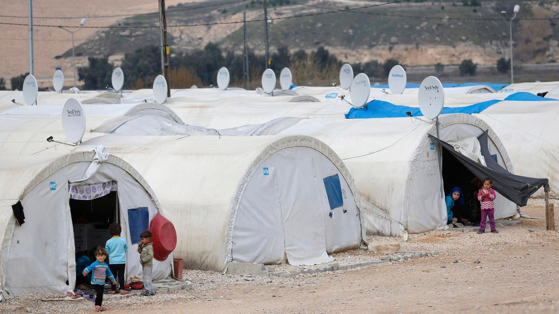 Syrian refugee children play outside their tents at a refugee camp in Nizip in Gaziantep province, near the Turkish-Syrian border (Reuters)