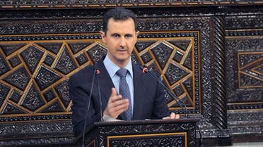 Syria's President Bashar al-Assad delivers a speech to Syria's parliament in Damascus, June 3, 2012,