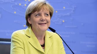 Reporter sings Happy Birthday to Angela Merkel