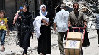 U.N. delivers first aid to besieged Syria town since 2012