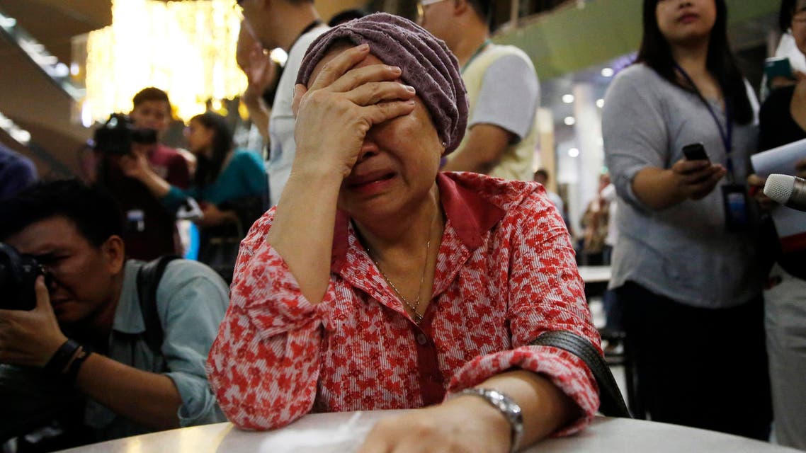 A woman, who said she believed her sister was on Malaysia Airlines flight MH17, cries as she waits for more information about the crashed plane at Kuala Lumpur International Airport in Sepang July 18, 2014. Reuters