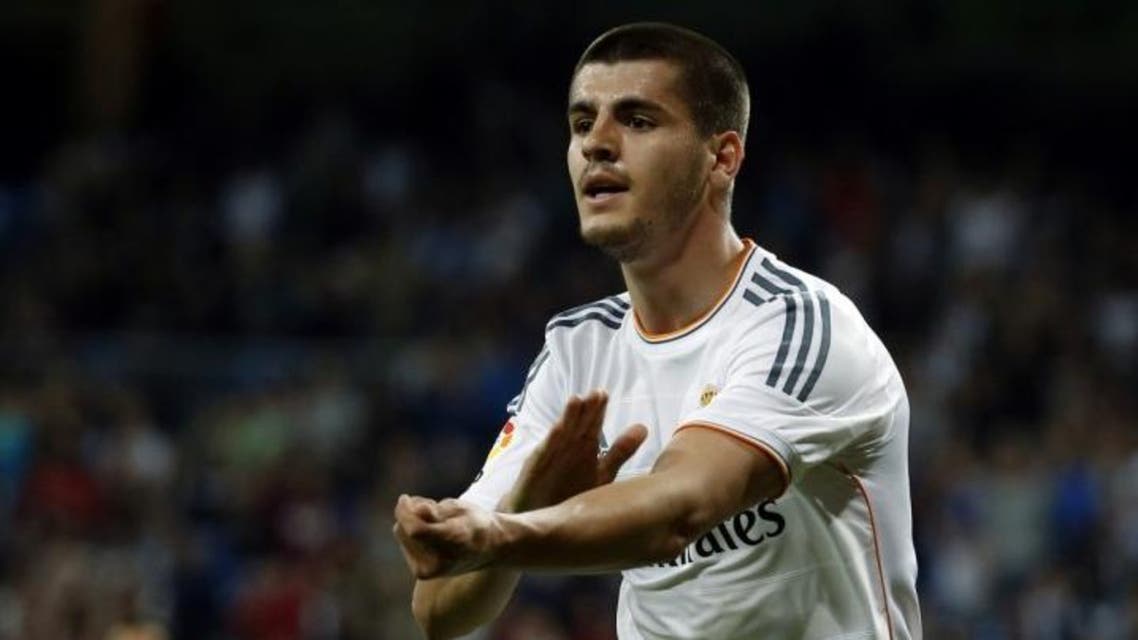 Real Madrid 's Alvaro Morata celebrates his goal against Almeria during their Spanish first division soccer match at Santiago Bernabeu stadium in Madrid, April 12, 2014.