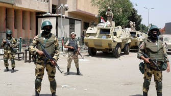 Gunmen kill 21 Egypt soldiers in checkpoint attack