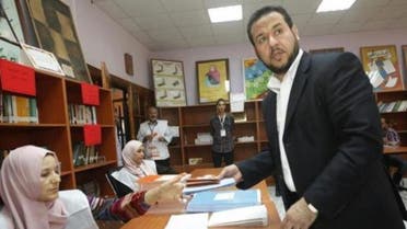 Abdel Hakim Belhadj, leader of Al-Watan party and former head of the Tripoli military council casts his vote at a polling station in Tripoli July 7, 2012. (Reuters)