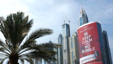 An advertising sign for a real estate company reading "Keep Calm There's no Bubble" is seen on a building in the Marina district of Dubai. (Reuters)