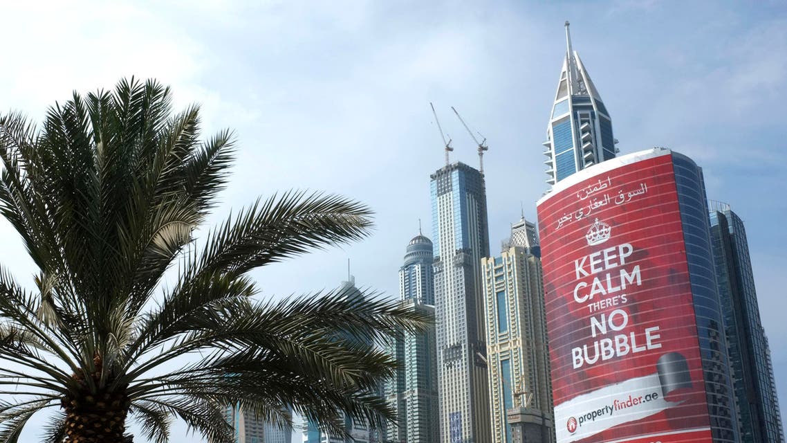 An advertising sign for a real estate company reading "Keep Calm There's no Bubble" is seen on a building in the Marina district of Dubai. (Reuters)