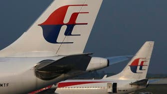 Malaysia airlines loss nearly doubles on MH370 impact 