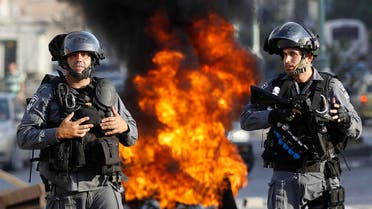 Israeli police officers stand guard during a protest by Israeli Arabs in the northern city of Nazareth, against Israel's offensive in the Gaza Strip July 21, 2014. (Reuters)