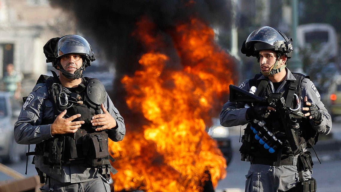 Israeli police officers stand guard during a protest by Israeli Arabs in the northern city of Nazareth, against Israel's offensive in the Gaza Strip July 21, 2014. (Reuters)