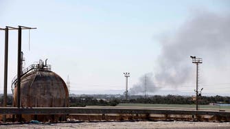 Fuel tanks hit in clashes near Libyan airport