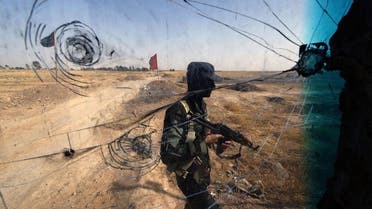 Iraqi Turkmen forces patrol a checkpoint on June 21, 2014, close to locations of jihadist Islamic State of Iraq and Syria (ISIS) fighters. AFP