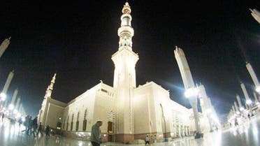 Muslims walk outside the Al-Masjid al-Nabawi (The Mosque of the Prophet) before the early morning prayer of al-Fajr in the holy city of Medina, in this January 16, 2014 photo. (Reuters)