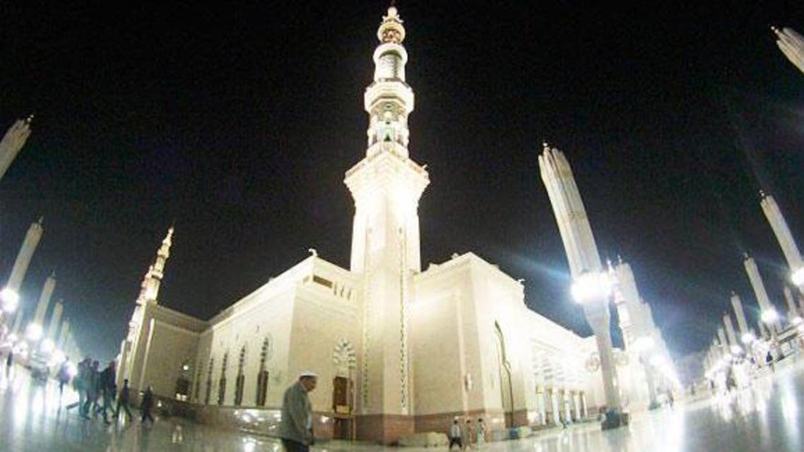 Muslims walk outside the Al-Masjid al-Nabawi (The Mosque of the Prophet) before the early morning prayer of al-Fajr in the holy city of Medina, in this January 16, 2014 photo. (Reuters)